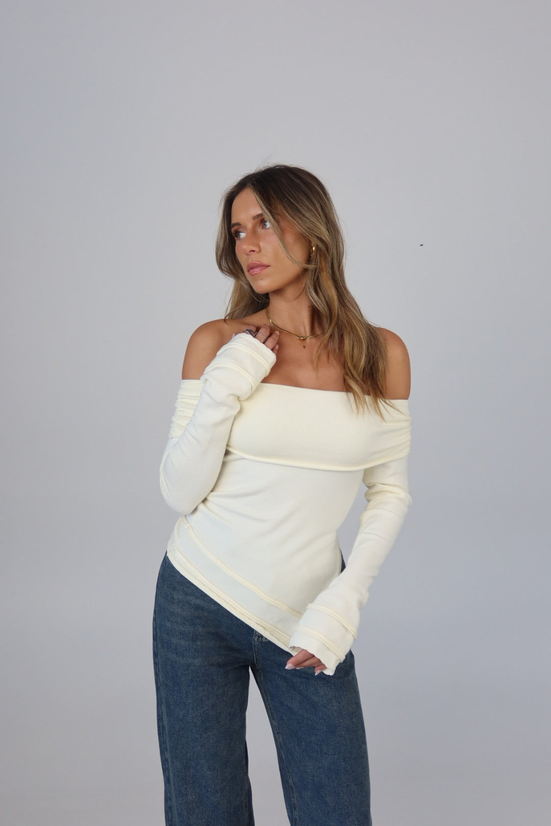 Annabelle Asymmetric Off-Shoulder Sweater in Ecru