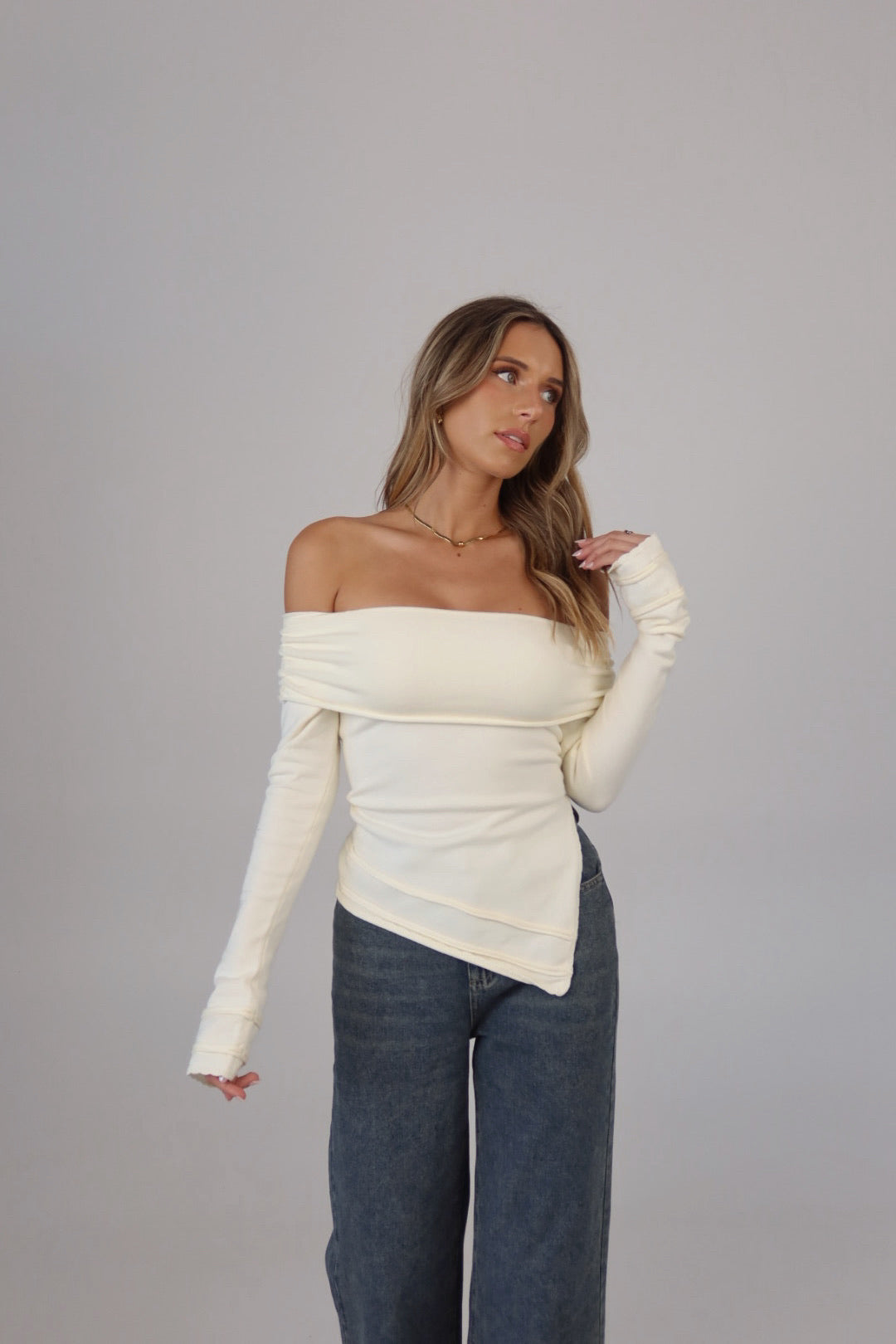 Annabelle Asymmetric Off-Shoulder Sweater in Ecru