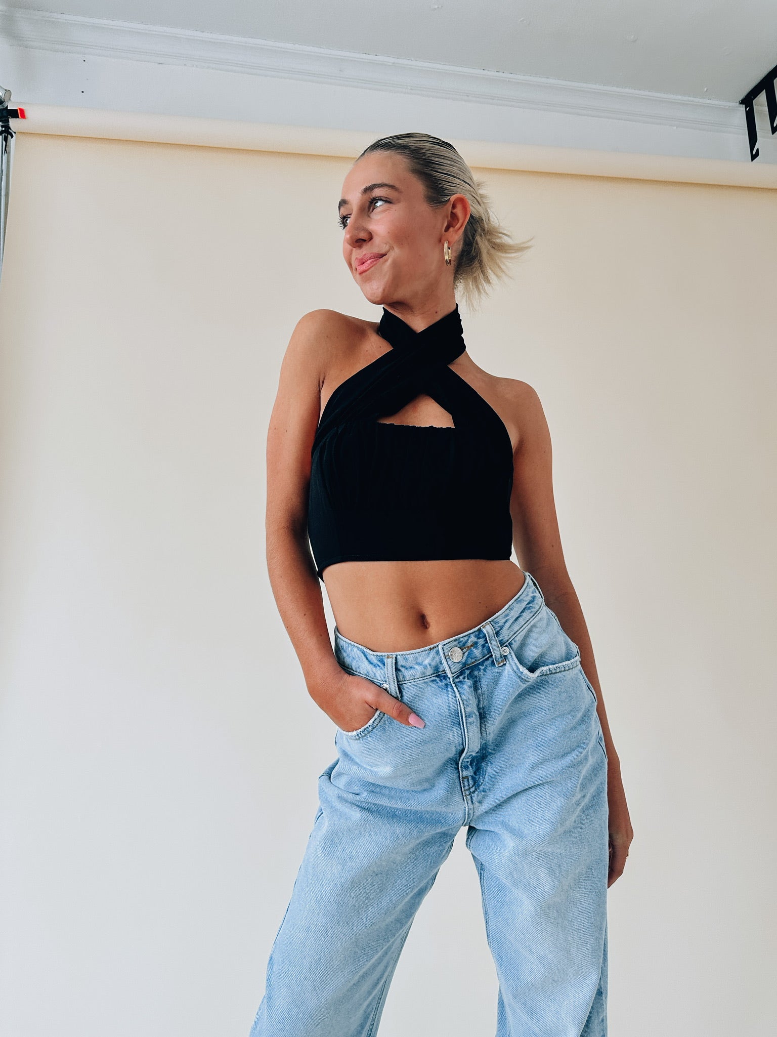 Kashmira Crossed Halter Crop In Black