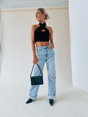 Kashmira Crossed Halter Crop In Black