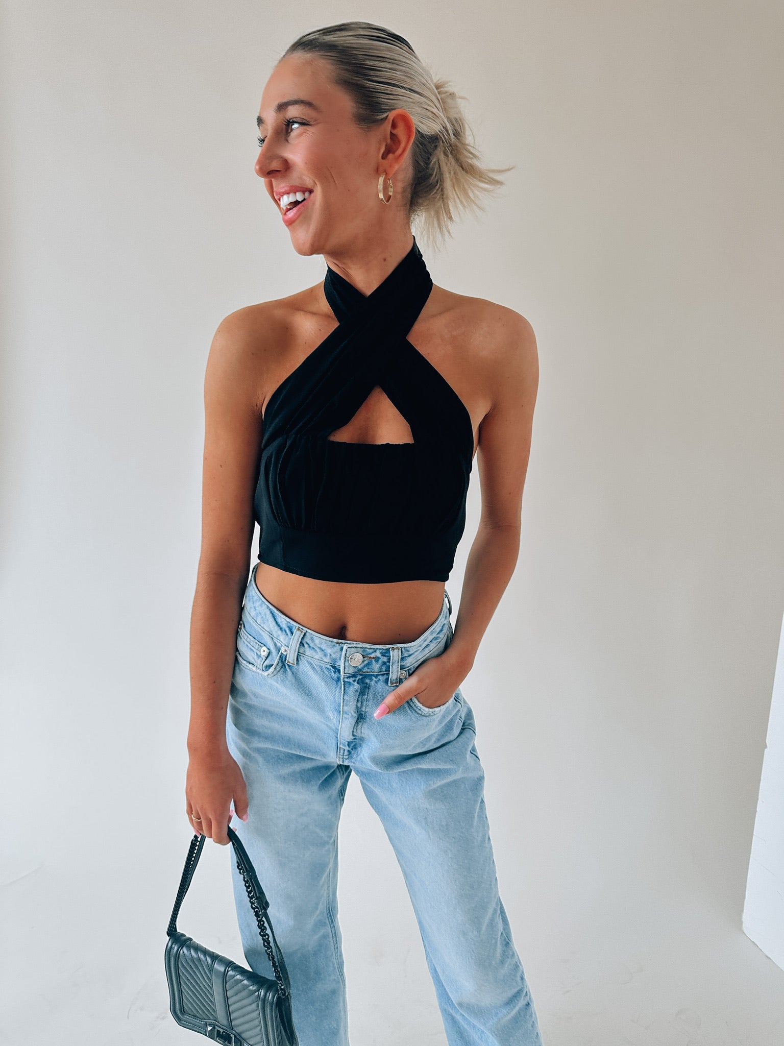 Kashmira Crossed Halter Crop In Black