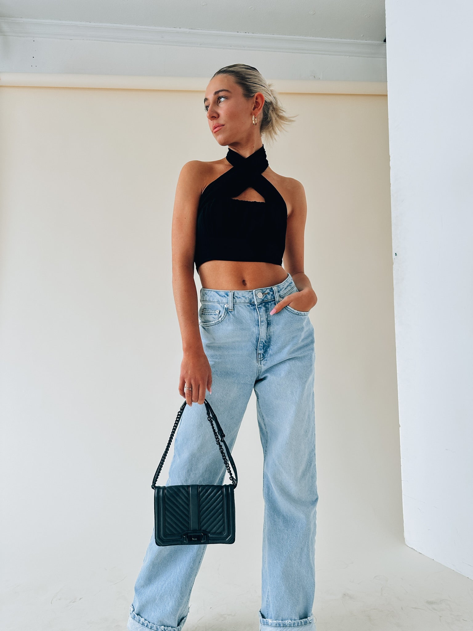 Kashmira Crossed Halter Crop In Black