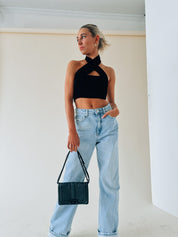 Kashmira Crossed Halter Crop In Black