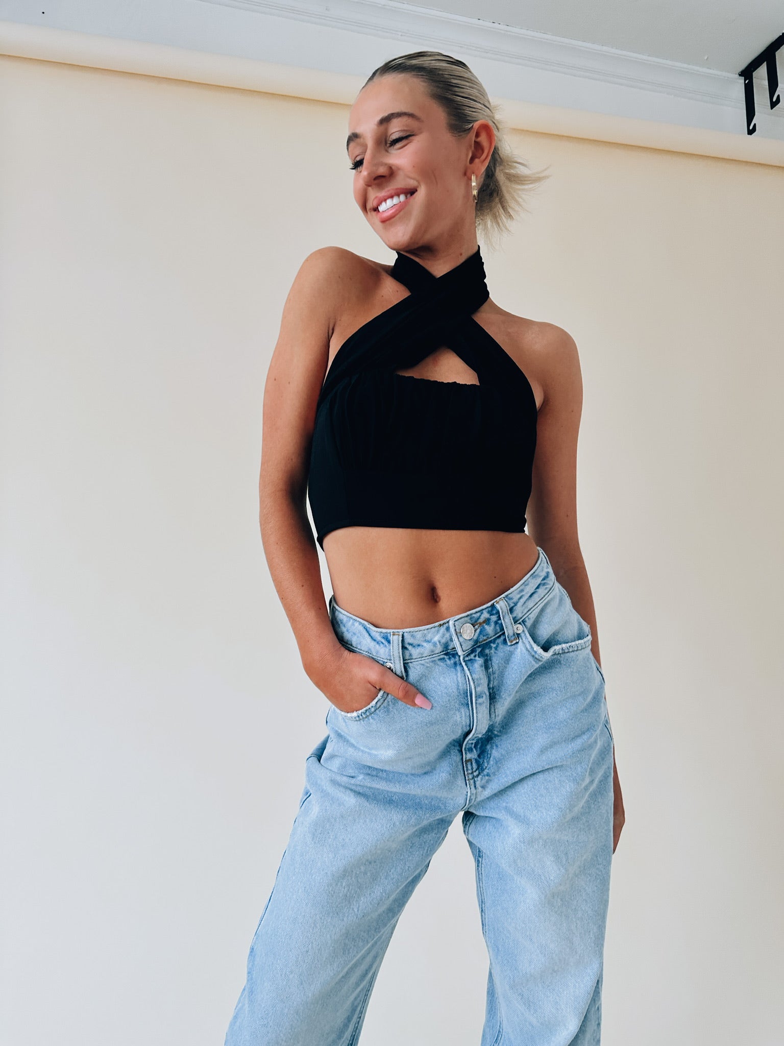 Kashmira Crossed Halter Crop In Black
