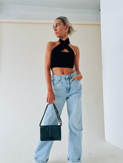 Kashmira Crossed Halter Crop In Black